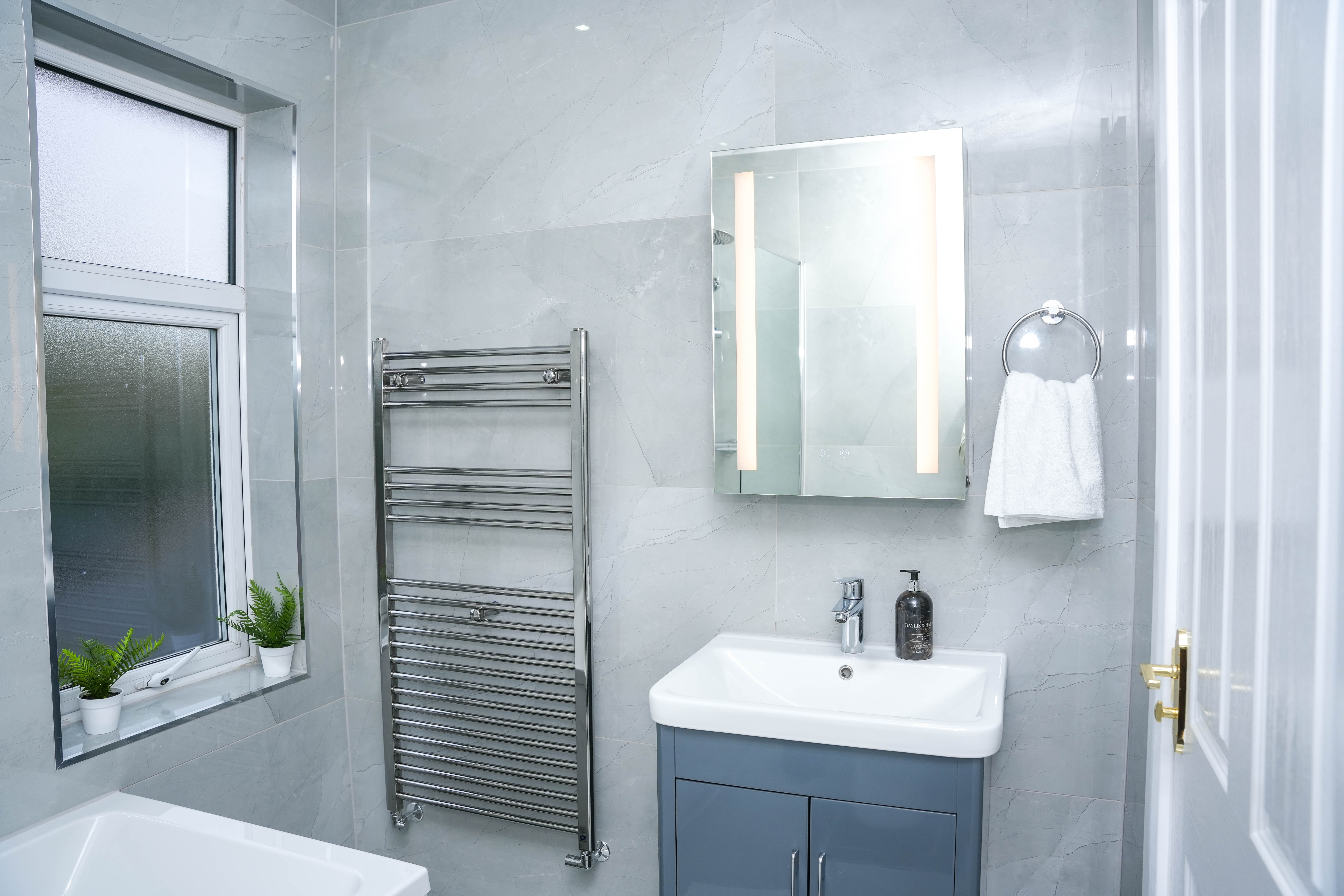 Bathroom at the Hounslow 4-Bedroom Home